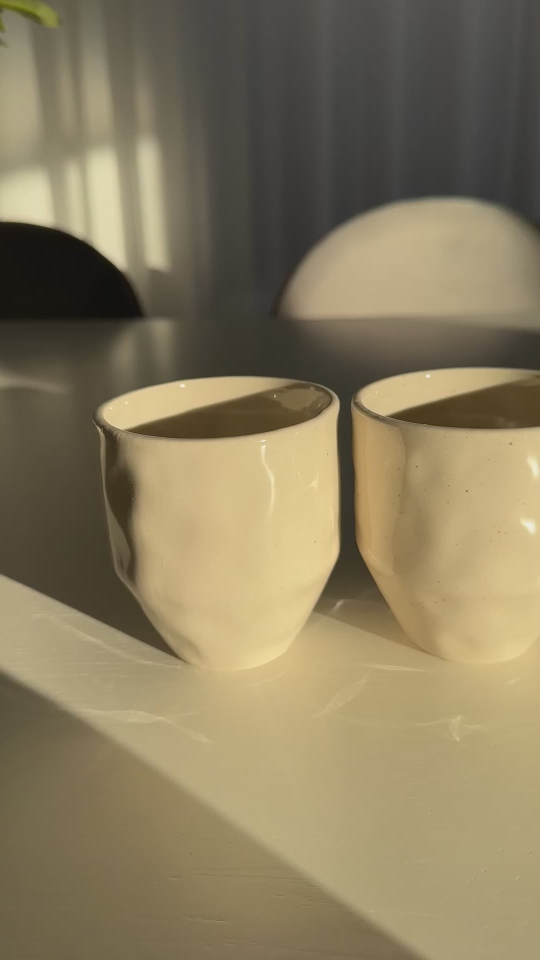 Video of organic wabi sabi coffee mugs set of 4 front view on dining table